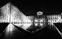 Paris black and white photos at night - Louvre and Pyramid